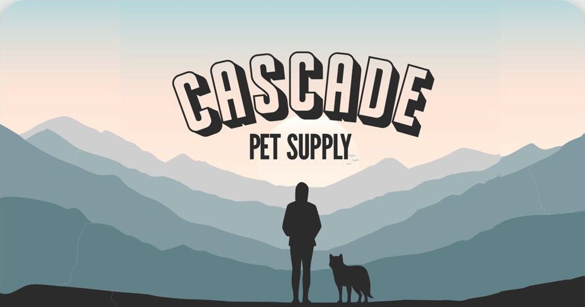 Cascade Pet Supply: a person and their dog looking out over layers of blue Cascade mountains at sunrise